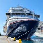 Carnival Dream docked at Nassau Cruise Port in the Bahamas under a bright blue sky