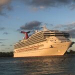 Carnival Sunrise cruise ship in golden evening light at Nassau in the Bahamas