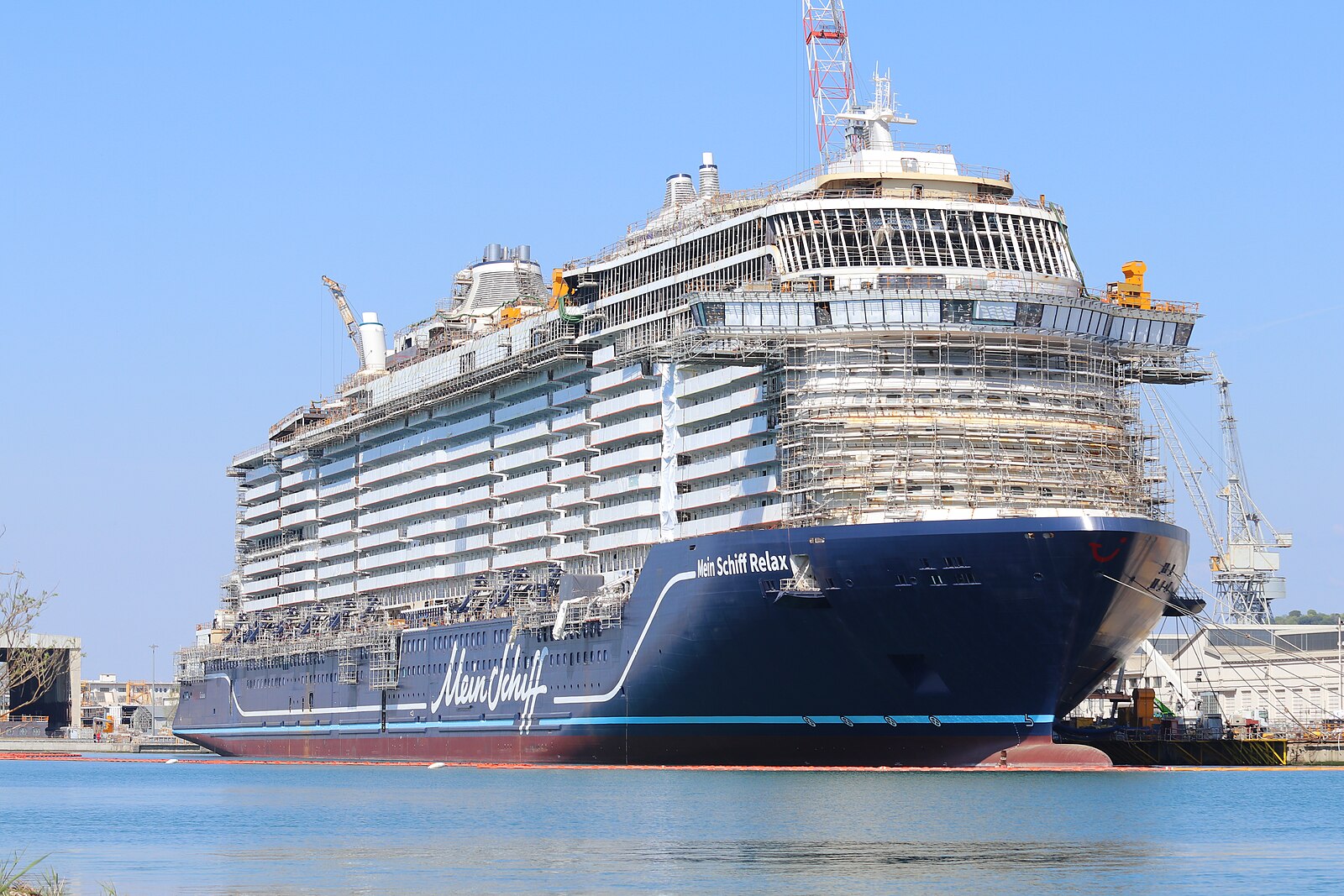 Mein Schiff Relax under construction with scaffolding at the Fincantieri shipyard in Monfalcone, Italy