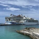 Grandeur of the Seas docked beside Star of the Seas at Perfect Day at CocoCay in the Bahamas with turquoise water