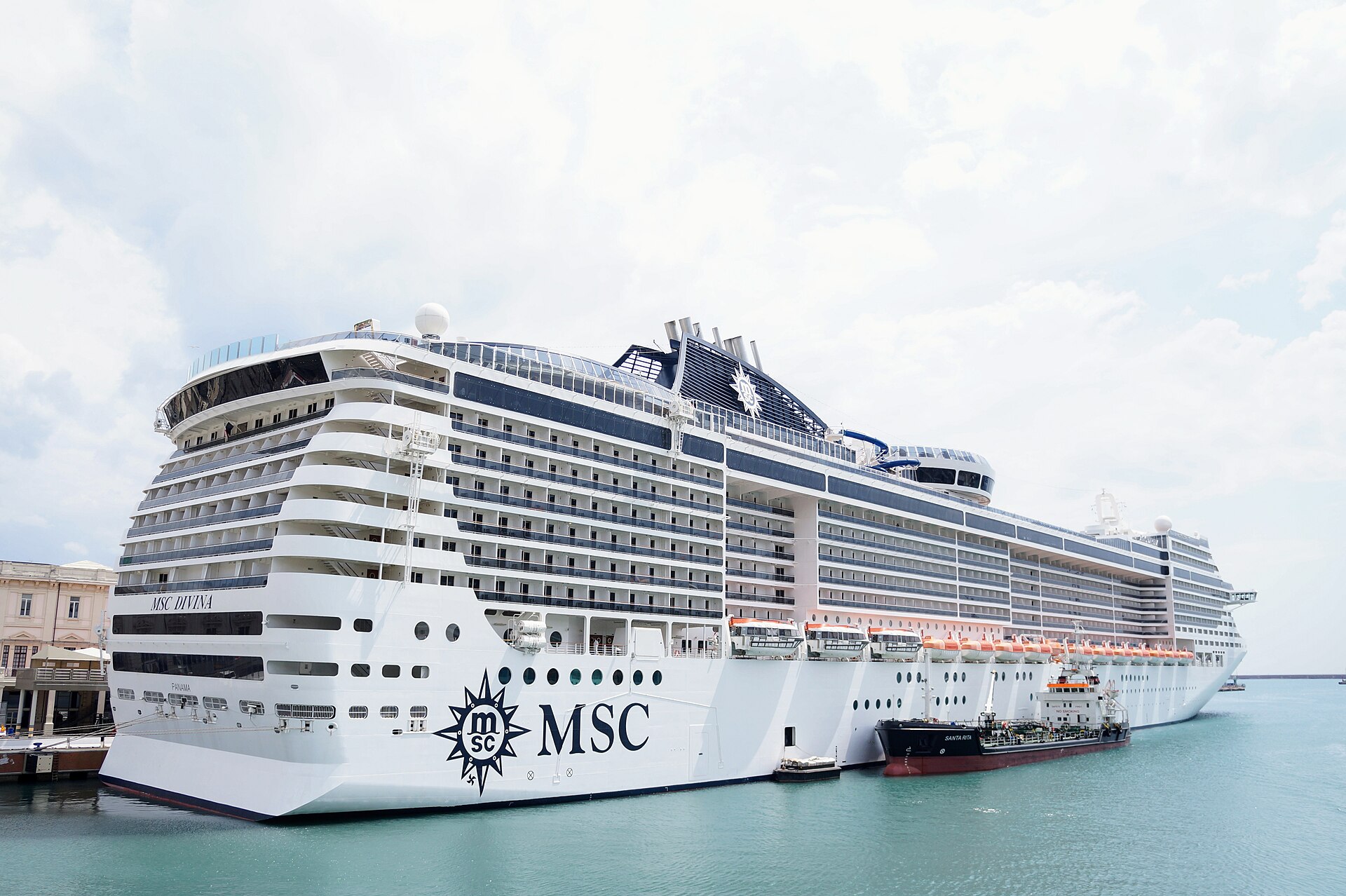MSC Divina moored alongside in turquoise water