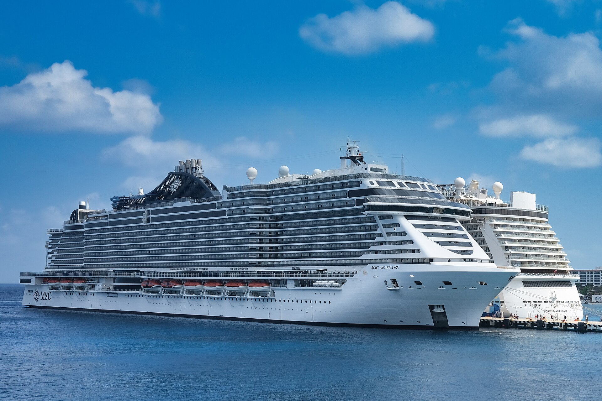 MSC Seascape docked in Cozumel, Mexico, under a blue sky with white clouds