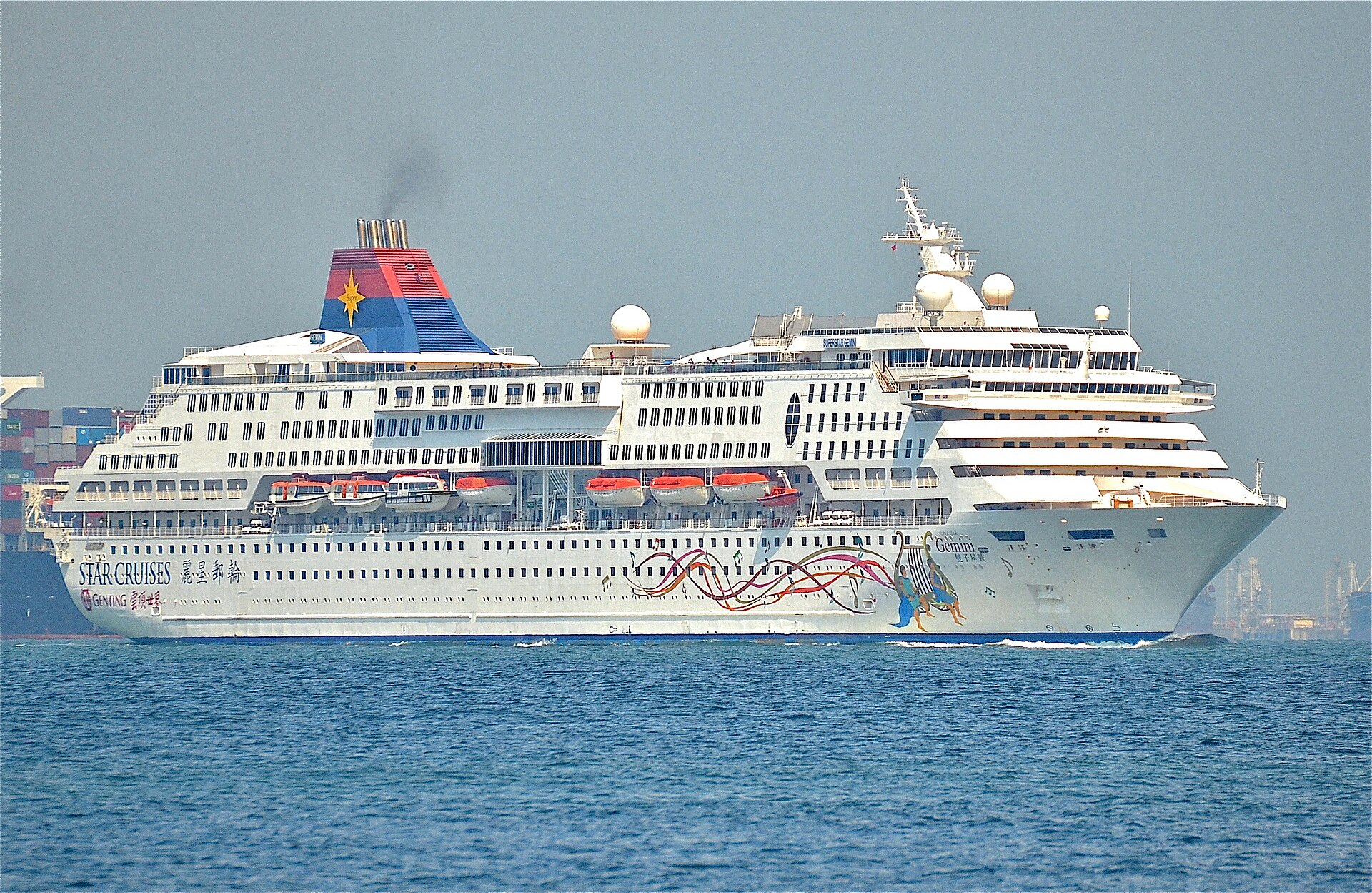 SuperStar Gemini in Star Cruises red and blue livery at sea