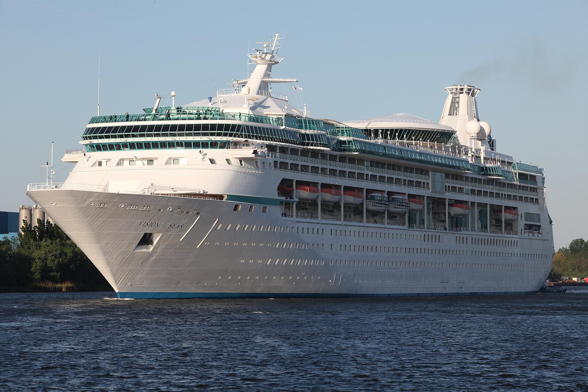 Royal Caribbean cruise ship Vision of the Seas under way under a blue sky