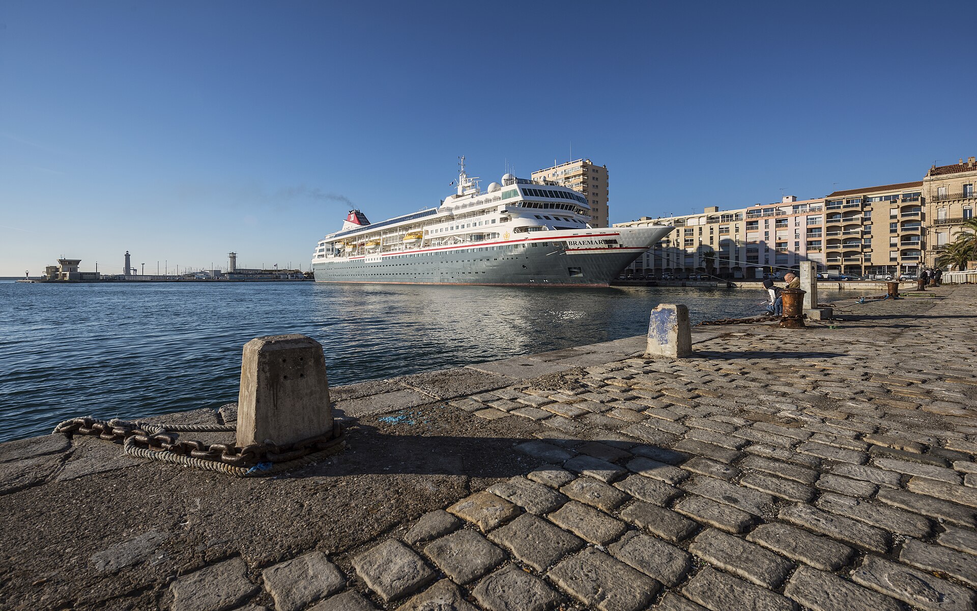 Fred. Olsen's Braemar moored at the Quai d'Alger in Sete, France, under a blue sky