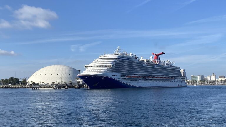 Carnival Panorama docked in Long Beach, California, under a bright blue sky