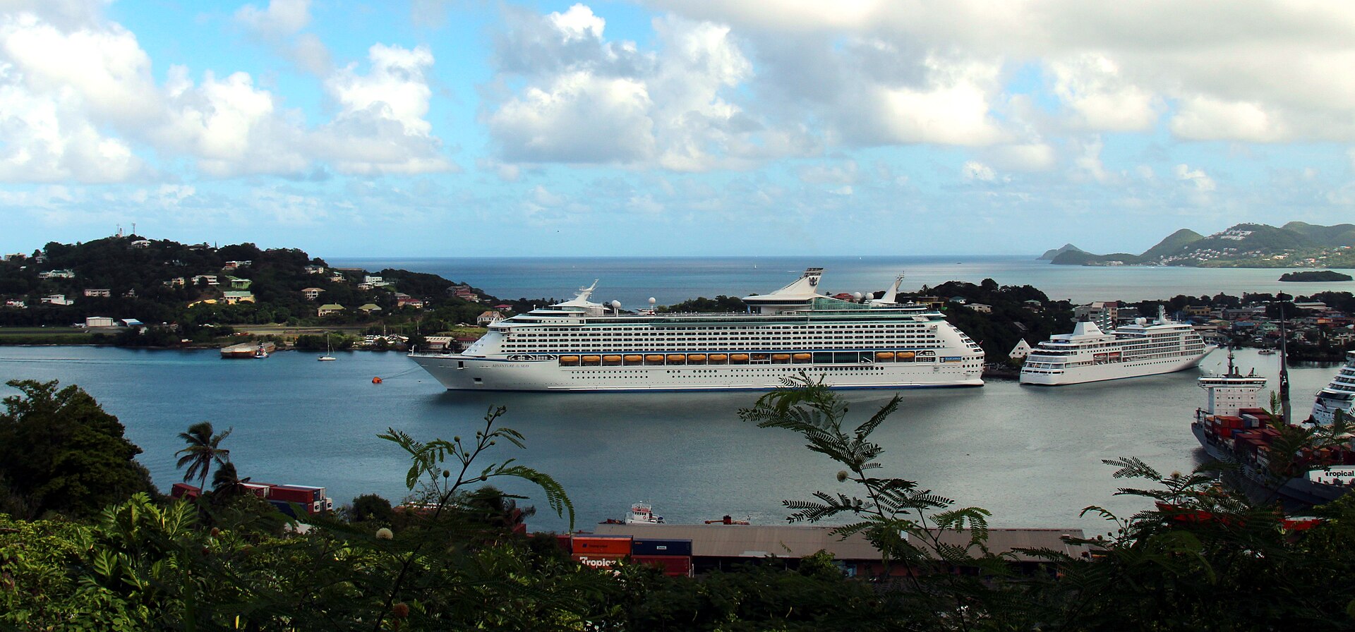 Adventure of the Seas and Silver Whisper docked in the green hills and turquoise harbour of Castries, St Lucia