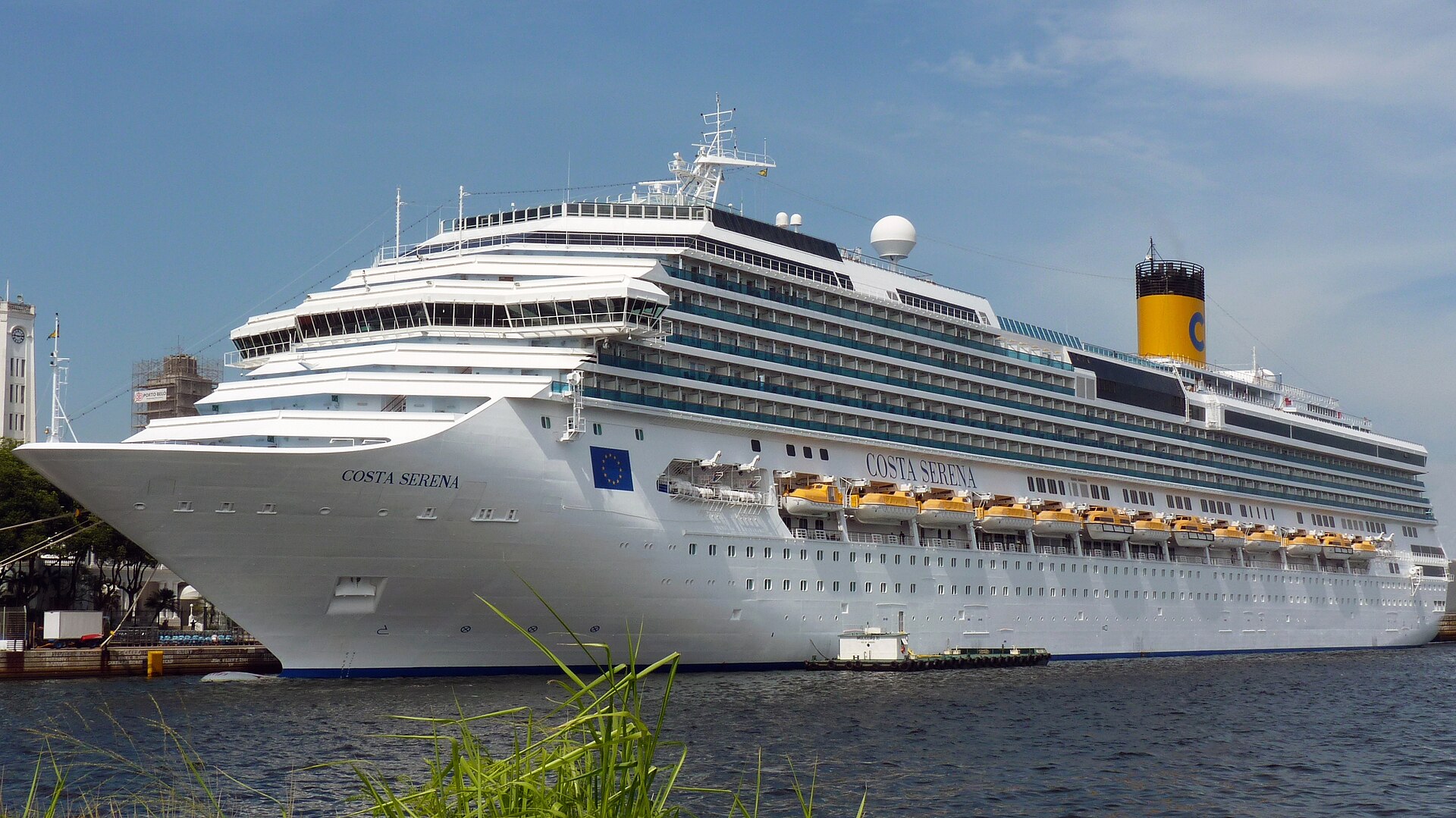 Costa Serena cruise ship with its yellow funnel arriving in Rio de Janeiro
