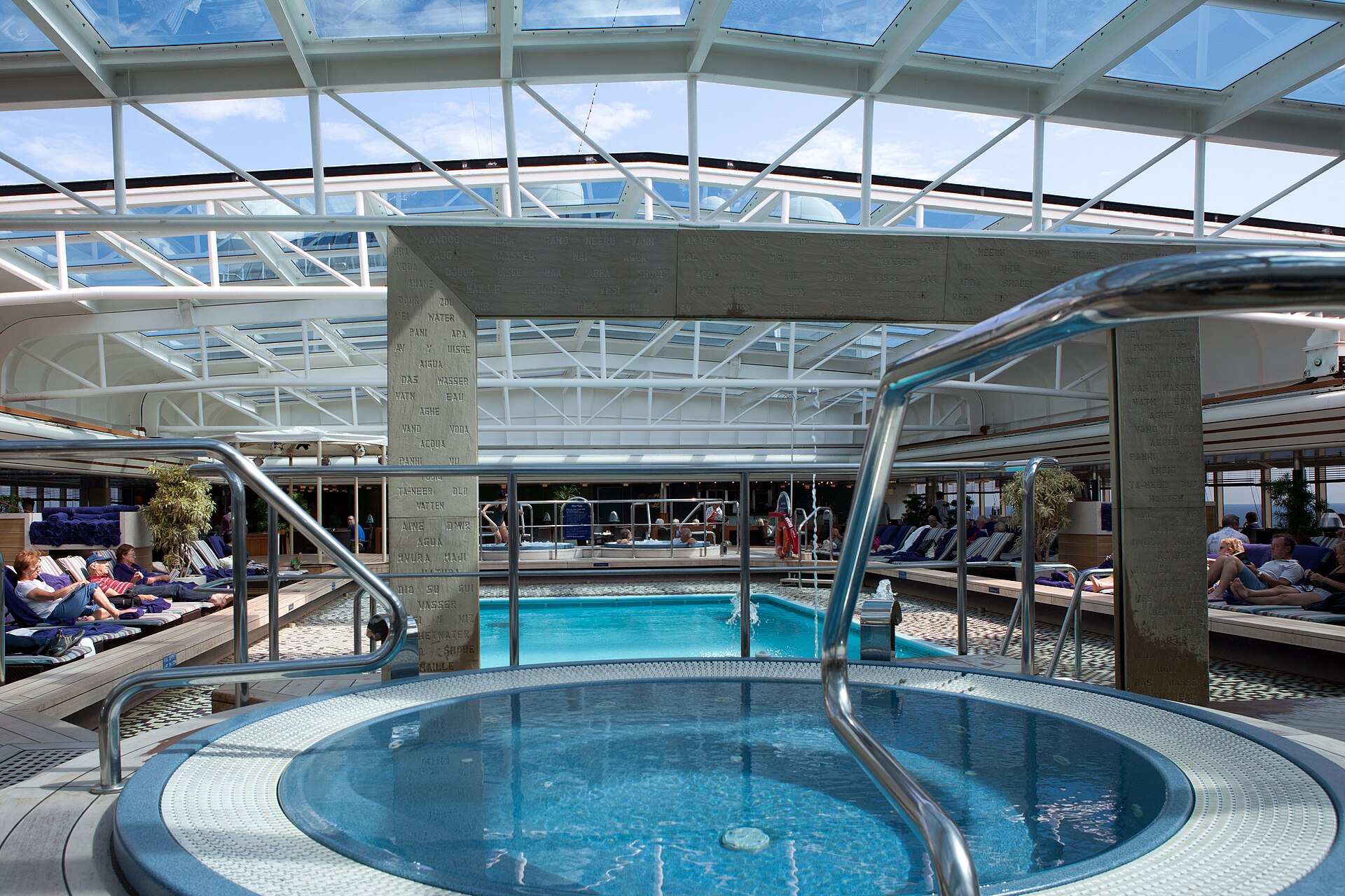 Hot tub and pool under the retractable glass roof on the Lido deck of Holland America's Eurodam