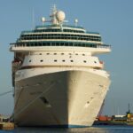 Royal Caribbean's Majesty of the Seas moored bow-on at Prince George Wharf in Nassau under a clear blue sky