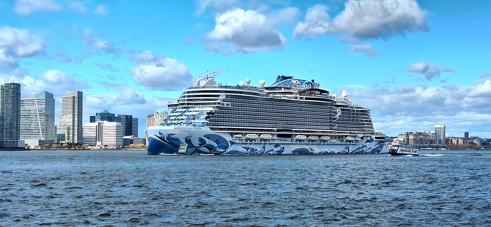 Norwegian Prima sailing on the Hudson River past Jersey City